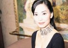 邝美云炒楼发家 现拥五亿身家